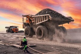 How can mining companies effectively reduce their environmental impact and control pollution?