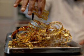 Gold nears record $3,600/oz level as weak US jobs data fuels rate-cut bets