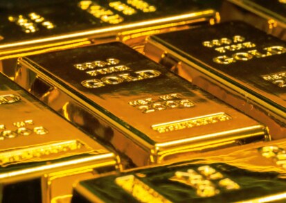 Gold heads for seventh straight monthly gain on safe-haven demand